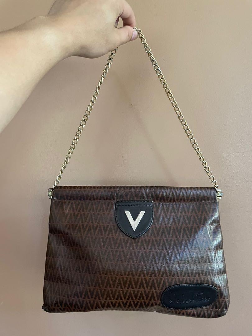 Valentino Clutch with chain sling (Category: Luxury Bags & Wallets) located in Quezon City. Submitted by thrift_saver07 (Listing ID 1097009487, Image 3). Description: Valentino Clutch bag with custom chain to make it shoulder bag..