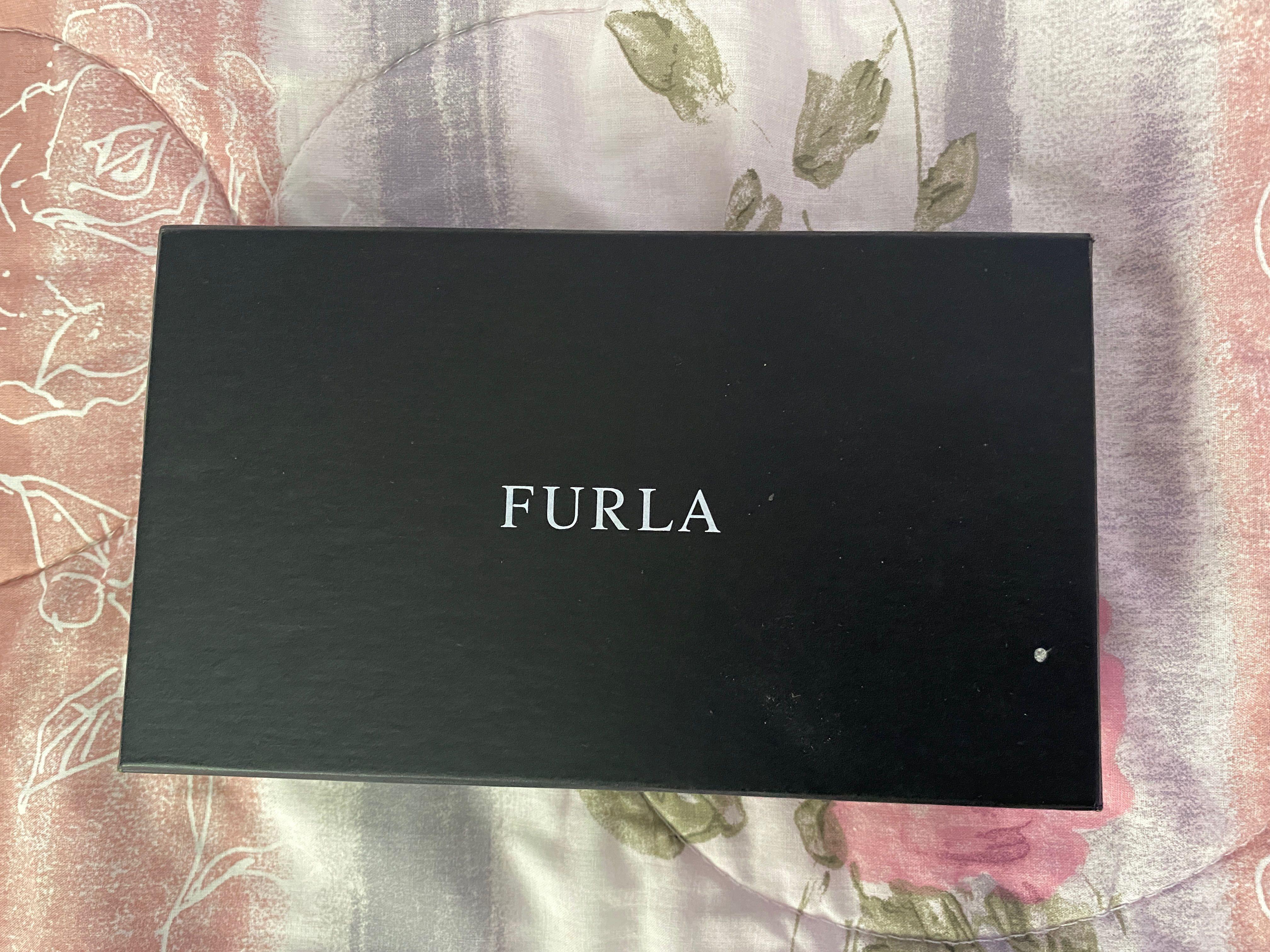 Authentic Furla Long Wallet (Category: Luxury Bags & Wallets) located in Lucena. Submitted by declutterqueen123 (Listing ID 1097360943, Image 2). Description: Bought in Gotemba Japan in 2017 Never used, complete with box, cards and pouch. Negotiable..
