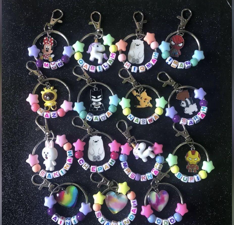 Customized keychains (Category: Craft Supplies & Tools) located in Singapore. Submitted by maylingcraft (Listing ID 1081901492, Image 10). Description: Pricing With normal charm $2.50 With premium charm $3.00 Kindly advice the following when placing your order 1. Star bead color choice 2. Round bead color choice 3. Name 4. Charm choice 5 Packaging choice Note : - random color will be given for alphabet beads - Maximum alphabet including spacing i