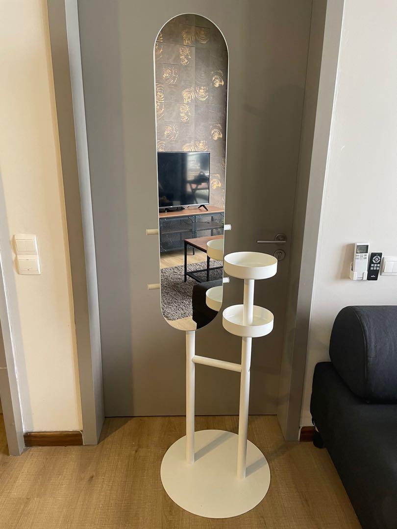 Ikea Makes a 3-in-1 Mirror That Serves as a Clothes Rack and Nightstand