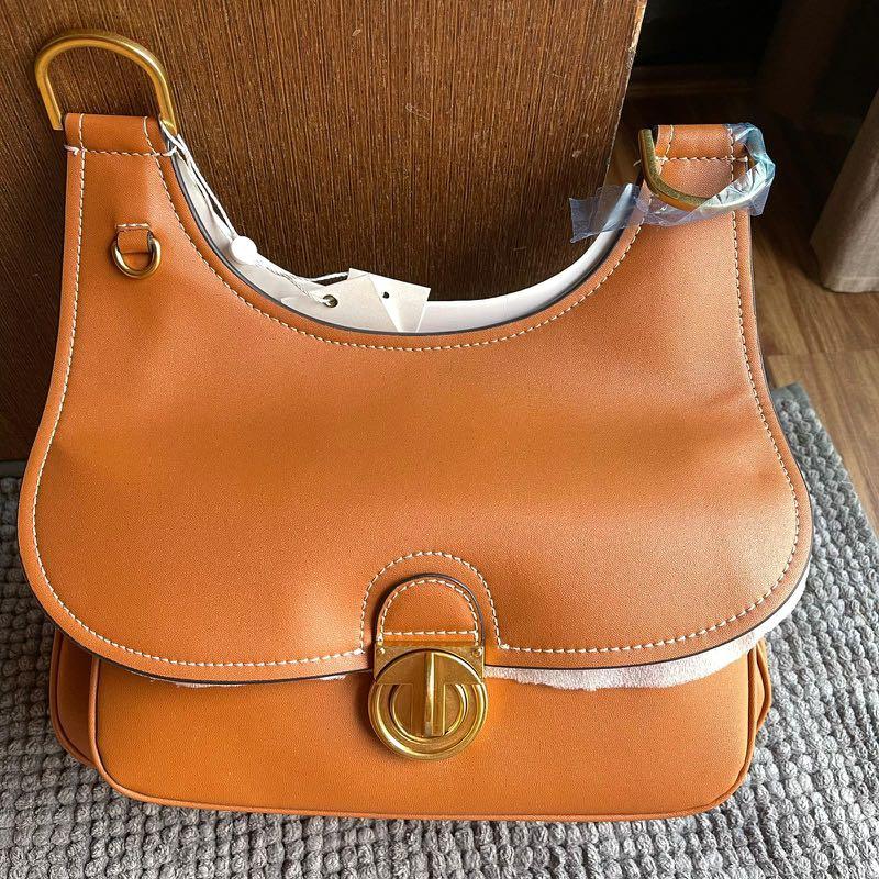 SALE# Tory Burch James Saddle Bag Moose, Women's Fashion, Bags & Wallets,  Shoulder Bags on Carousell