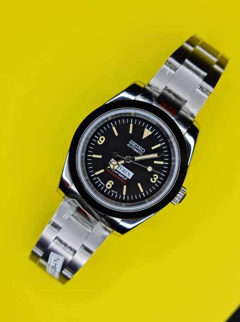 Seikolex " Explorer " Homage Mod (Category: Men's Watches) located in Manila. Submitted by markwrist07 (Listing ID 1097370894, Image 2). Description: Seikolex Homage Mods 40mm restocked and repriced at PHP14,999! USD 320 PM us for orders! 🙏 -https://www.facebook.com/markangeles510 New and Improved 904L stainless steel Seikolex Homage Mod 40mm • SUBMARINER • YACHTMASTER • GMT Specifications: - 904L stainless steel Sub Case 40mm - Sapphire Crystal