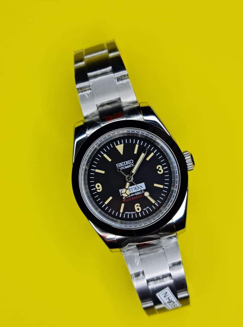 Seikolex " Explorer " Homage Mod (Category: Men's Watches) located in Manila. Submitted by markwrist07 (Listing ID 1097370894, Image 3). Description: Seikolex Homage Mods 40mm restocked and repriced at PHP14,999! USD 320 PM us for orders! 🙏 -https://www.facebook.com/markangeles510 New and Improved 904L stainless steel Seikolex Homage Mod 40mm • SUBMARINER • YACHTMASTER • GMT Specifications: - 904L stainless steel Sub Case 40mm - Sapphire Crystal