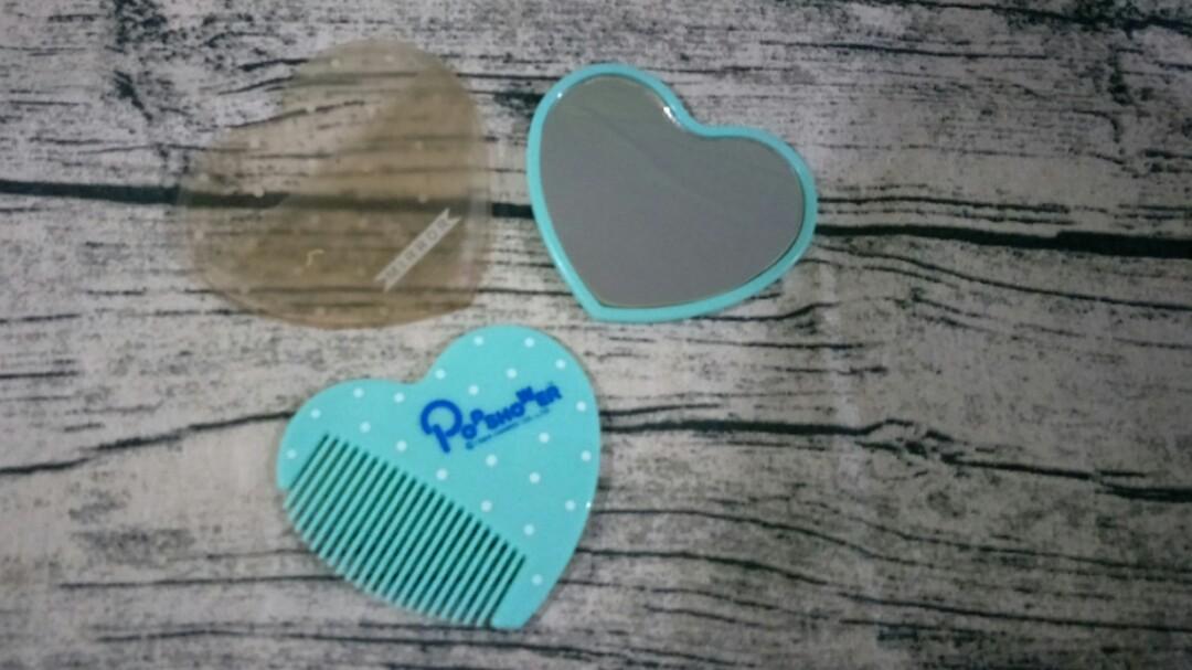 Authentic Vintage Sanrio Popshower mirror and comb set (Category: Mirrors) located in Paranaque City. Submitted by trinkets_by_joy (Listing ID 1091838667, Image 1). Description: AUTHENTIC MADE IN JAPAN VINTAGE COLLECTOR'S ITEM heart-shaped pocket comb and mirror set with mirror sleeve. comb in almost brand new condition (never carried) flaw - back part of the mirror (pls see photos) mirror sleeve discolored with age measurements (photos) conditio