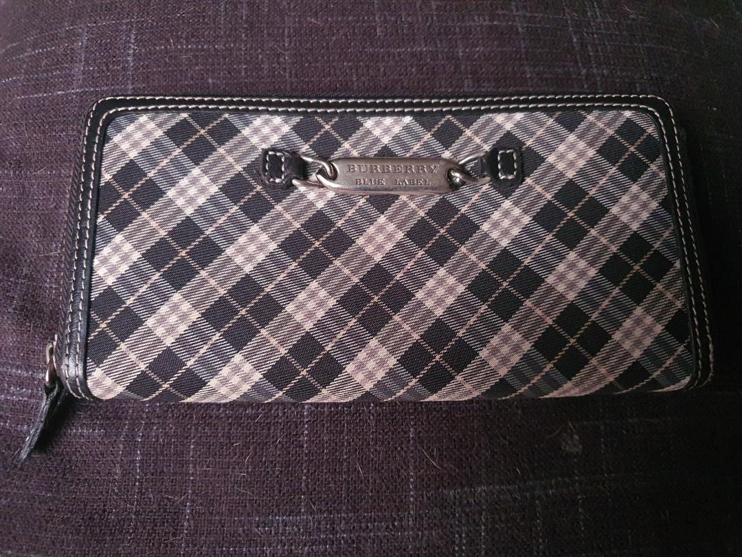 Burberry Blue Label Zippy Wallet (Category: Wallets & Card holders) located in Makati City. Submitted by picknclick (Listing ID 1091812496, Image 1). Description: Gently used. No inclusions..
