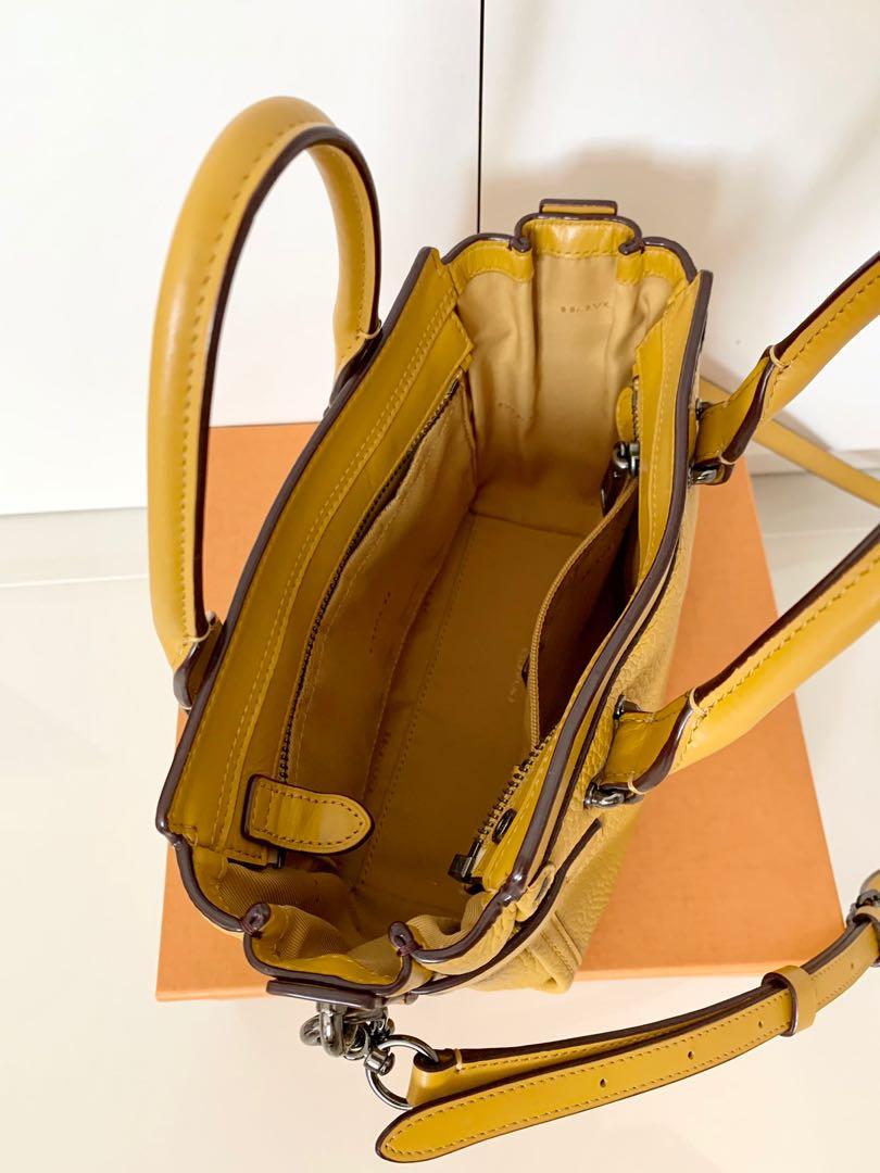 Coach yellow sling discount bag