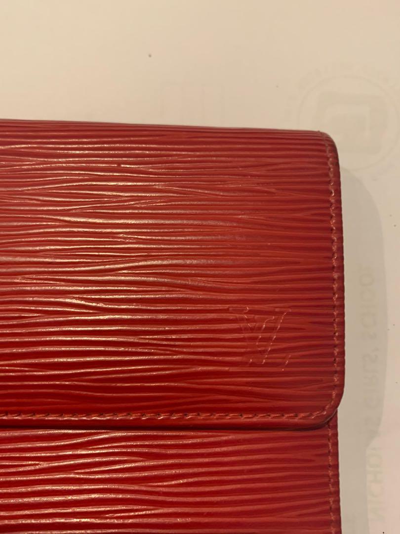 079 Pre-Owned Authentic Louis Vuitton Red Epi Leather International Wallet  Date code: CA1916