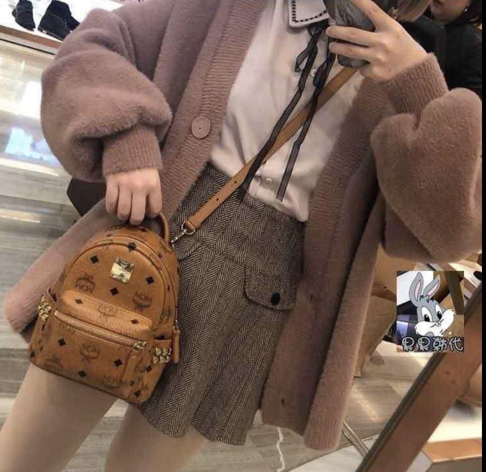 Mcm sling backpack cheap