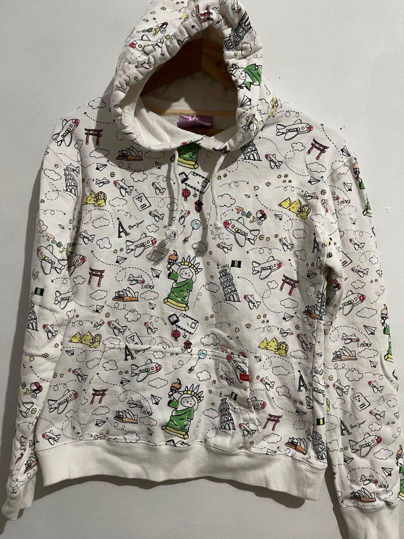 Pullover Jacket (Category: Coats, Jackets and Outerwear) located in Taguig. Submitted by impulsivemoims (Listing ID 1091806903, Image 1). Description: Pullover Hooded Jacket Size: S-Semi Large Color: White base with print Condition: 10/10 Super cute travel themed print 😍😍😍 RFS: Decluttering ✅Discount for multiple items .
