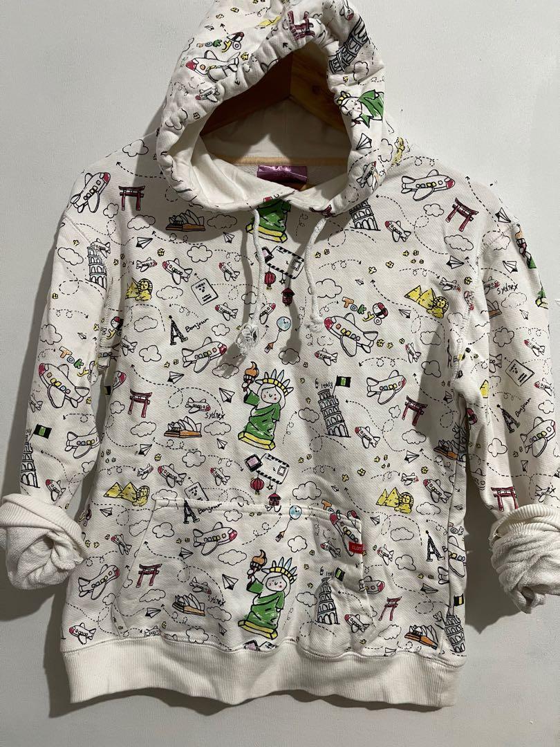 Pullover Jacket (Category: Coats, Jackets and Outerwear) located in Taguig. Submitted by impulsivemoims (Listing ID 1091806903, Image 2). Description: Pullover Hooded Jacket Size: S-Semi Large Color: White base with print Condition: 10/10 Super cute travel themed print 😍😍😍 RFS: Decluttering ✅Discount for multiple items .