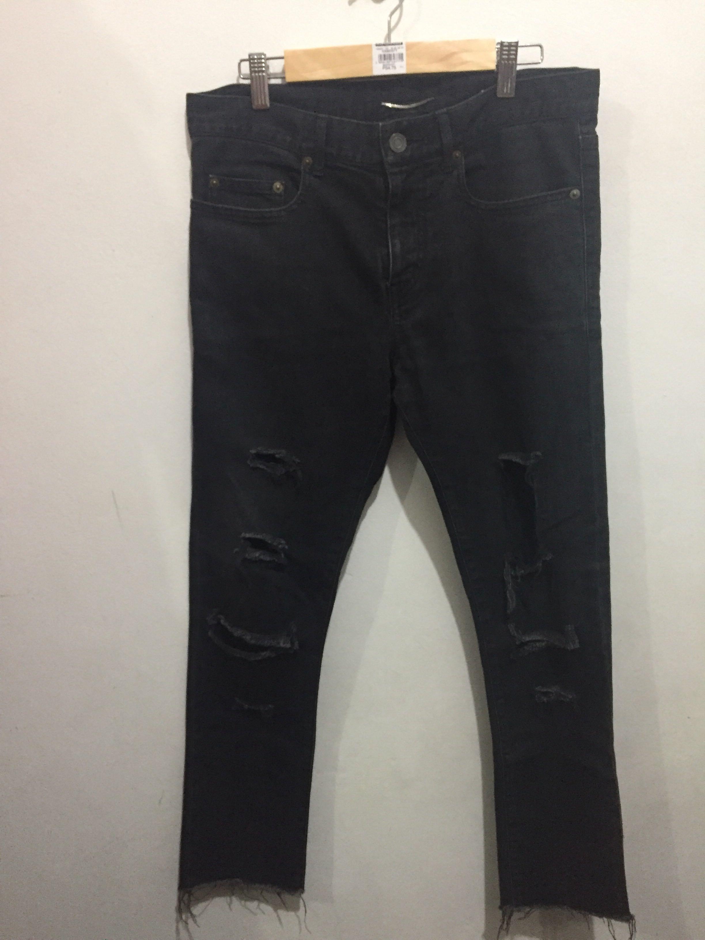 Saint Laurent distressed jeans (Category: Luxury Apparel) located in Mabalacat. Submitted by designerbrandsforless (Listing ID 1091910491, Image 3). Description: Made in Japan Size 29” cotton fabric little bit stretchy Measurement laid flat approximately waist 16” Rise 11” inseam 26” length 36” still in very good condition .