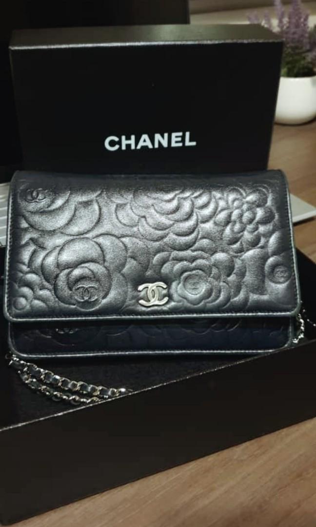 CHANEL Black Camellia Embossed WOC Wallet On Chain Shoulder Bag at 1stDibs