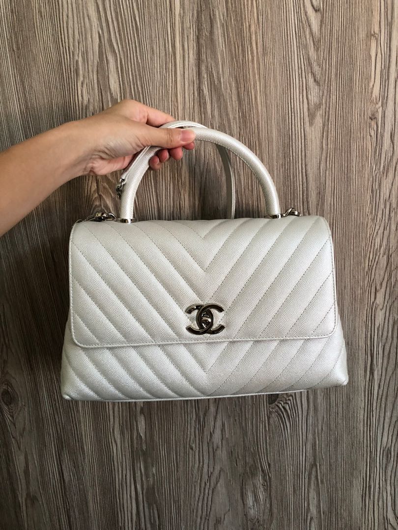 Chanel coco handle white chevron medium SHW, Women's Fashion, Bags &  Wallets, Shoulder Bags on Carousell