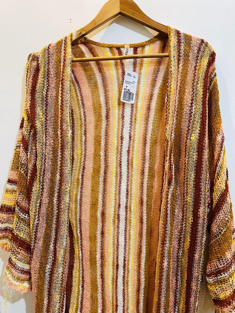 Forever 21 Swimcover / Cardi (Category: Coats, Jackets and Outerwear) located in Taguig. Submitted by impulsivemoims (Listing ID 1097733488, Image 1). Description: Authentic Forever 21 Knit Swimcover/ Long Cardi Color: Camel/Multi Size: M on tag but will most likely fit up to plus size RFS: I have two of these .