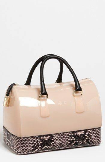 Furla Limited Edition Candy Bag with Leather & Python contrast (Category: Luxury Bags & Wallets) located in Quezon City. Submitted by lix12 (Listing ID 1097710598, Image 2). Description: ❣💯 Authentic ❣Exterior: Rubber material and python print calf leather ❣light gold hardware ❣double top handles ❣with provided sling ❣top zip closure ❣padlock closure ❣leather base ❣Interior: very good condition ❣Dimensions: 11"L x 7"W x 7.8"H/Depth ❣Japan bought
