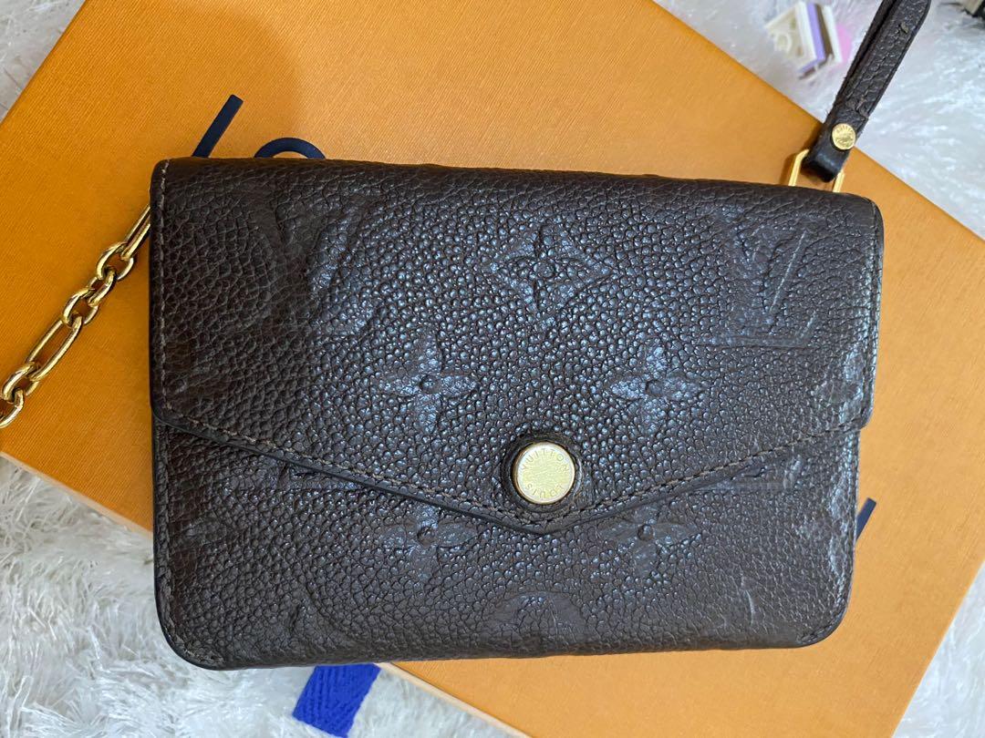 ♥️RESERVED♥️ Guaranteed Authentic LV Empreinte pouch/ wallet (Category: Luxury Bags & Wallets) located in Naga. Submitted by akimadison.ph (Listing ID 1097639507, Image 3). Description: Guaranteed Authentic Louis Vuitton wallet / key pouch Same size and look as the verso recto (30k+).