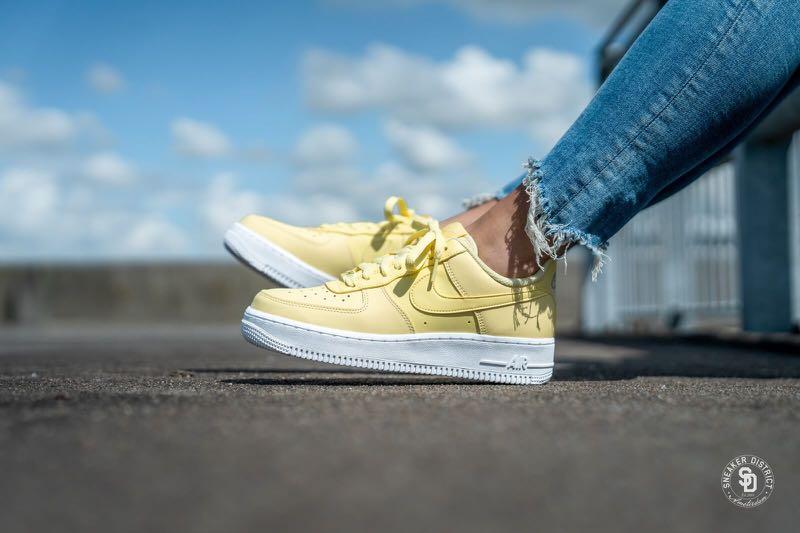 white bicycle yellow air force 1