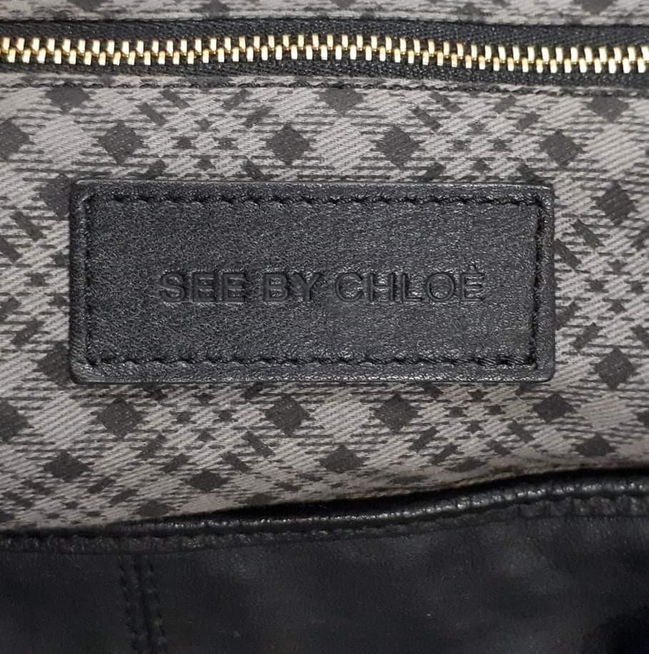 See By Chloe Two Way Bag (Category: Luxury Bags & Wallets) located in Taguig. Submitted by esa.agustin (Listing ID 1097769580, Image 3). Description: Original See By Chloe black soft leather two way bag. With dust bag. Made in Morocco..