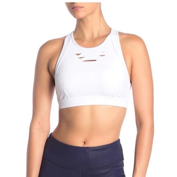 Alo Ripped Warrior Top - Black/White/Hunter Green/Rosewood - Size XS/S (Category: Activewear) located in Singapore. Submitted by leeeeamy (Listing ID 1092023839, Image 3). Description: Worn a few times - All in excellent condition (1 is BNWT) Alo Ripped Warrior top has subtle details, crossed back, strong straps and cut holes ensure that you'll always look stylish. Ideal in combination with Ripped Warrior leggings. Available In 2 COLORS: Black - 