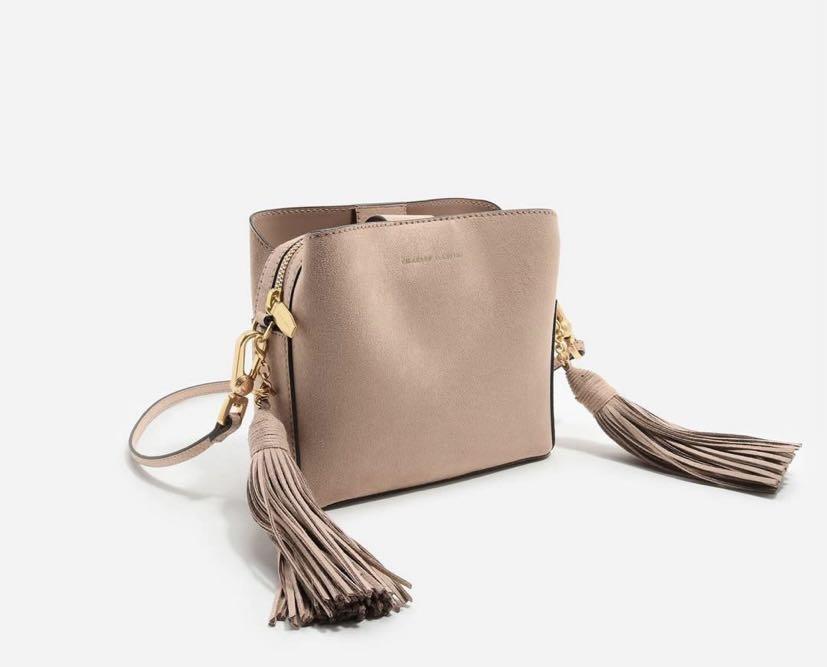 charles keith tassel detail suede sling bag Women s Fashion Bags Wallets Cross body Bags on Carousell