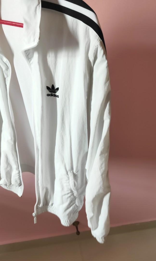 All white top adidas windbreaker