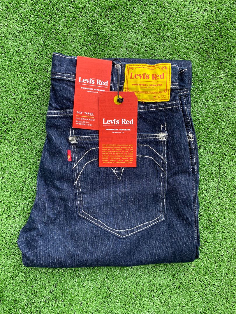 Levi's Red 502 Taper Fit Jeans, Men's Fashion, Bottoms, Jeans on Carousell