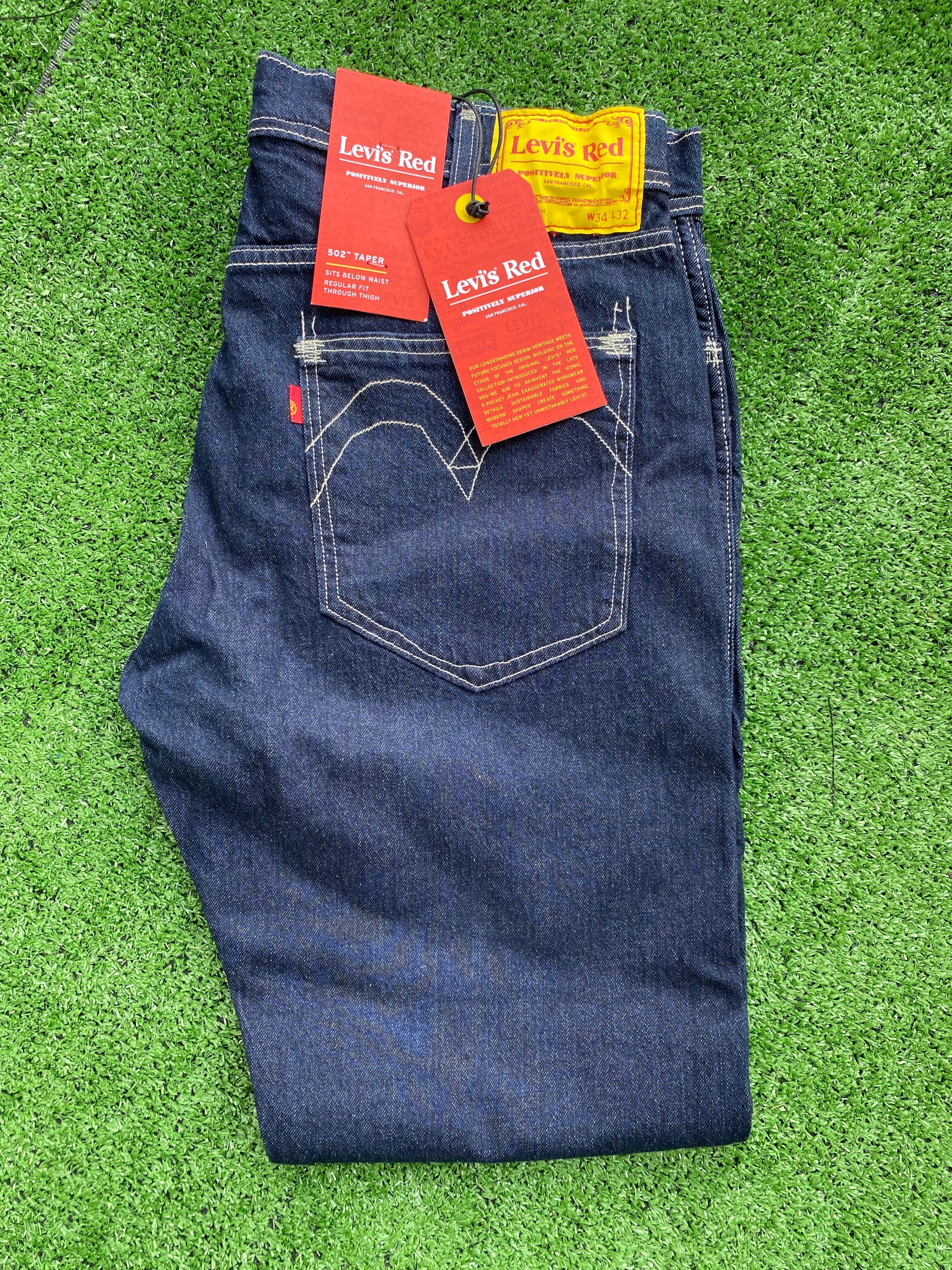 Levi's Red 502 Taper Fit Jeans, Men's Fashion, Bottoms, Jeans on Carousell