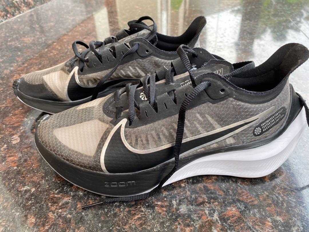 nike running zoom gravity white