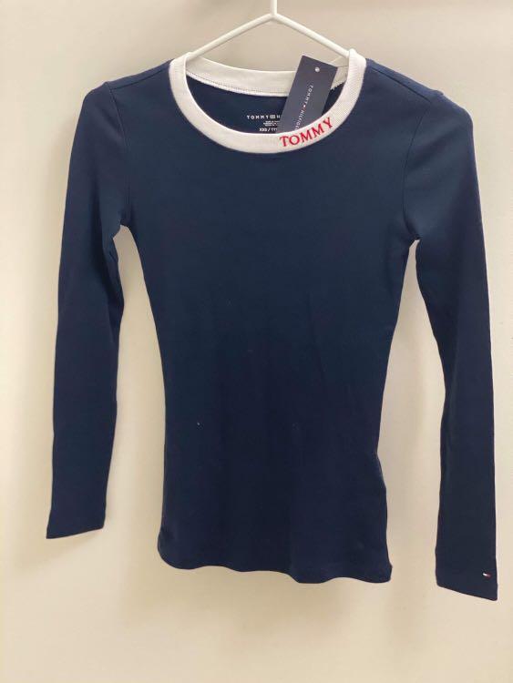 Tommy Hilfiger longsleeves (Category: Longsleeves) located in Angeles City. Submitted by raisedlog (Listing ID 1092325533, Image 2). Description: Authentic brandnew tommy hilfiger longsleeves Xs on tag but runs Small Comes with paper bag.