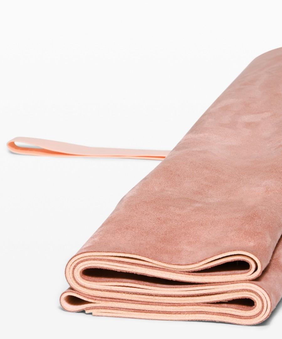 Lululemon Carry Onwards Mat (Category: Exercise Mats) located in Manila. Submitted by victoriangelique (Listing ID 1092513312, Image 2). Description: Use as a top layer on your mat to soak up sweat in hot yoga classes Lightly mist the microfibre to improve grip during practice Practice with microfibre side facing up Attached elastic keeps mat together. Tuck it under your mat during practice Unfolded Dimensions: 66cm x 180cm (26 x 71"), 2mm (0.08)