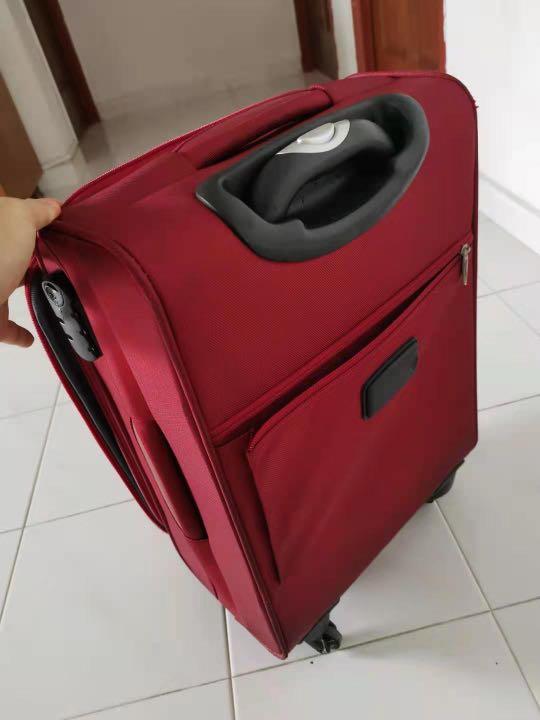 American tourister handy red luggage Hobbies Toys Travel Luggage on Carousell
