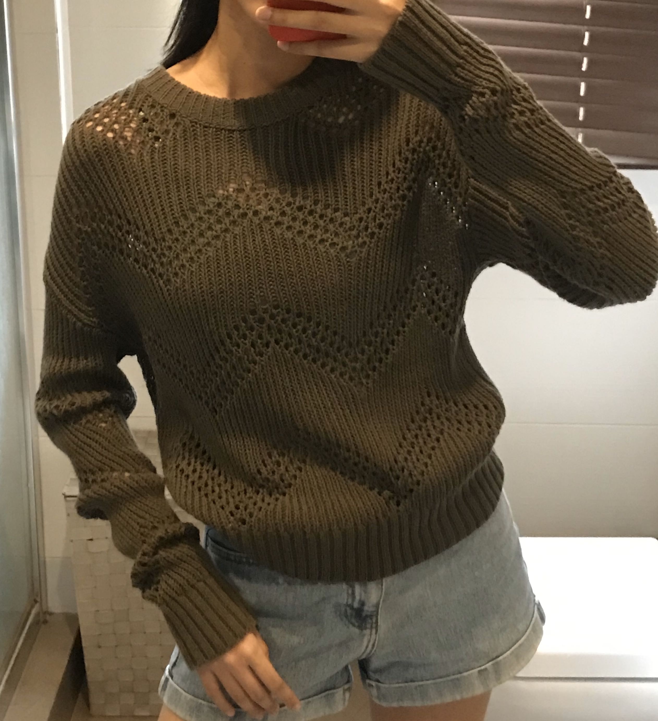Olive green knitted sweater on sale