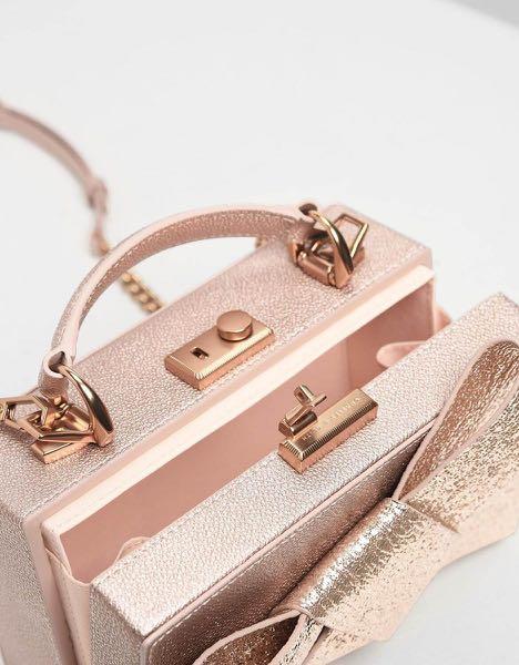 Metallic ribbon top shop handle bag