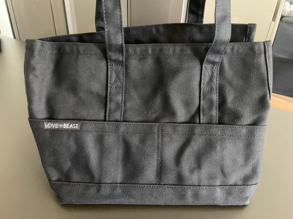 Love the beast dog bag top