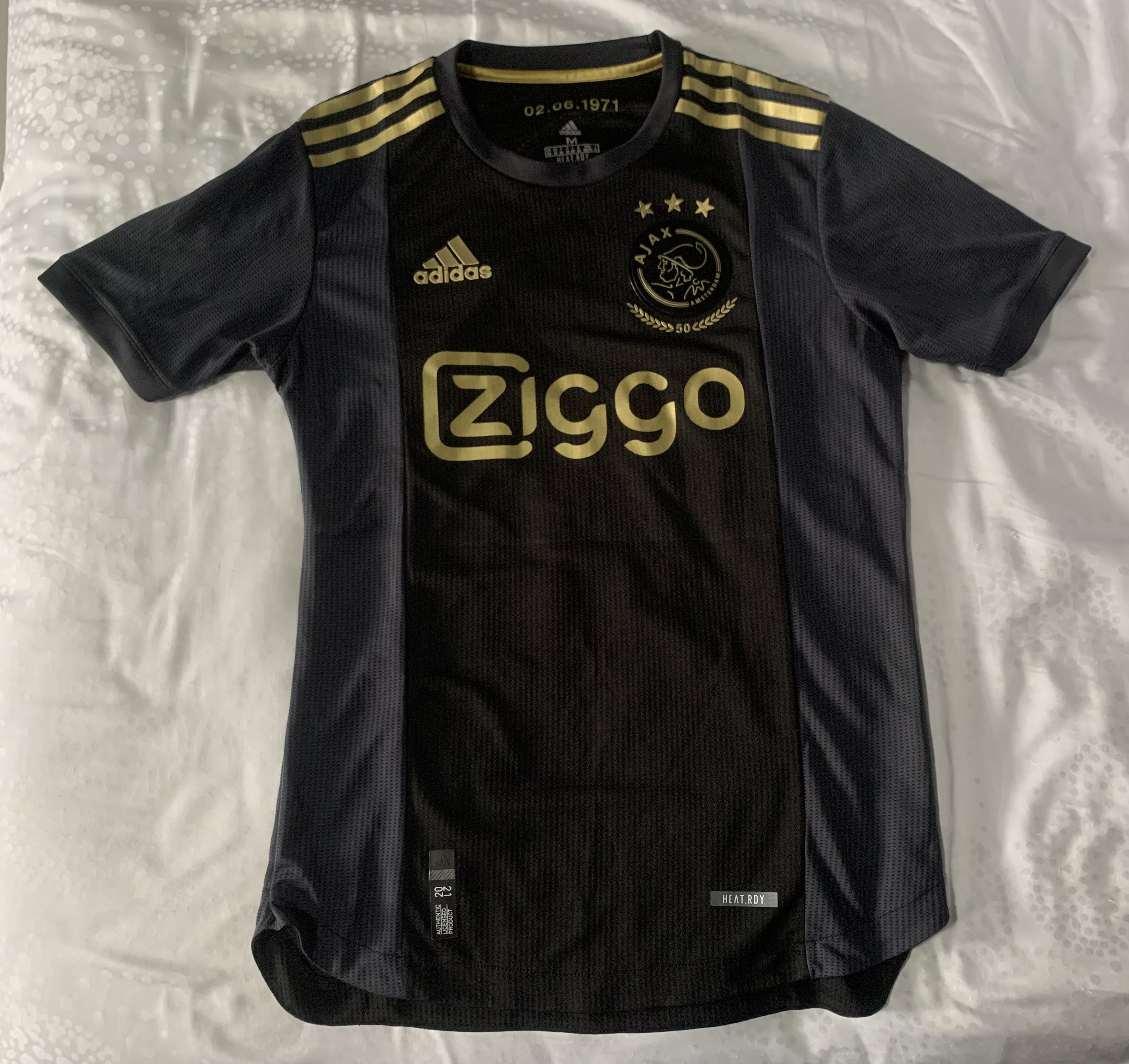 Ajax black 2024 and gold jersey