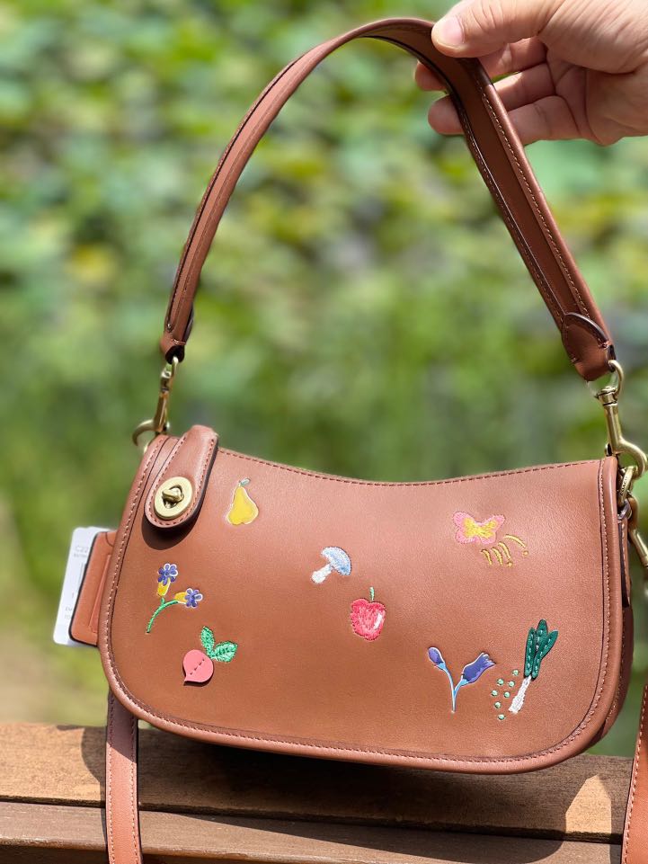 swinger bag with garden embroidery coach