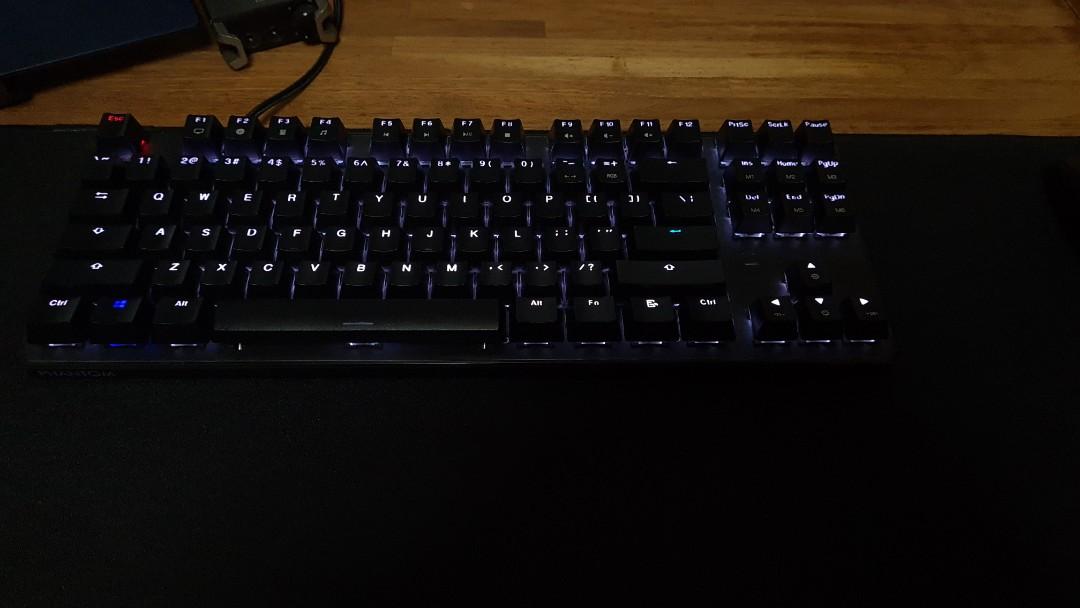 Tecware Phantom TKL (Category: Computer Keyboard) located in Singapore. Submitted by marclee_98 (Listing ID 1092895653, Image 2). Description: Tecware Phantom RGB with Outemu Black Switches (Linear) or Outemu Blue Switches. Get both sets of switches for $20. Phantom Shroud (+$10) and PBT keycaps (+$29)..