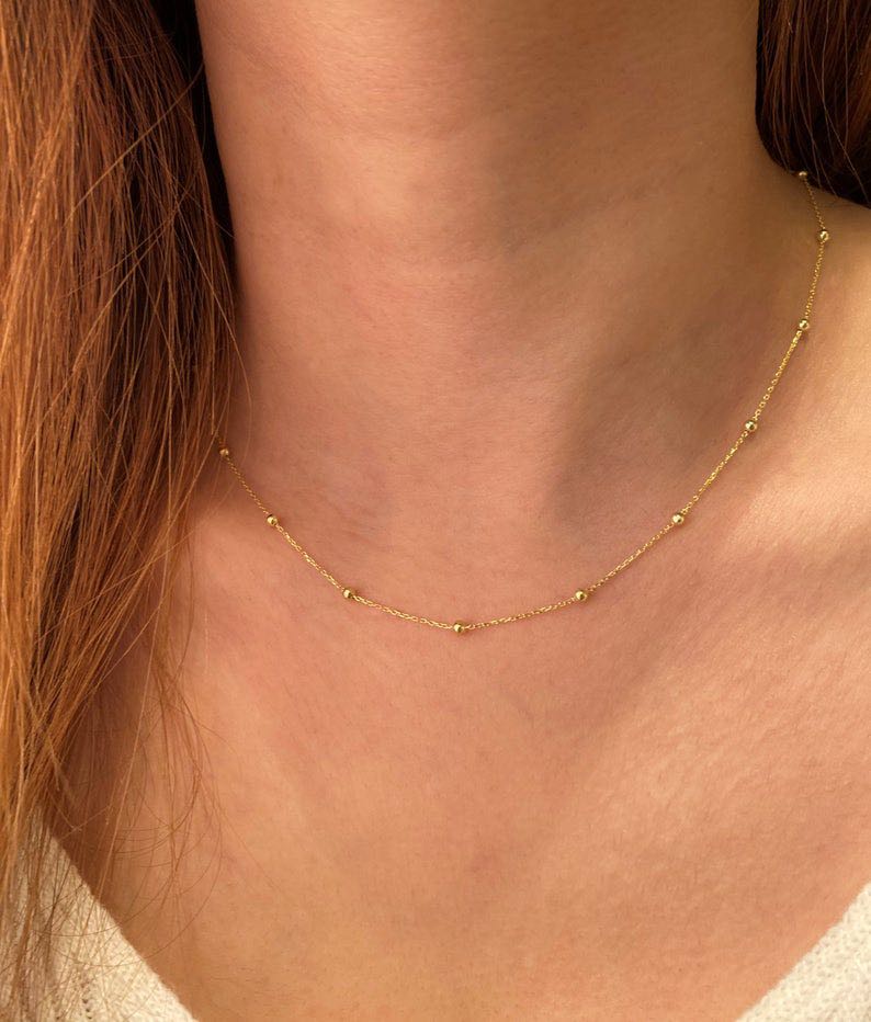 Gold bead station necklace sale