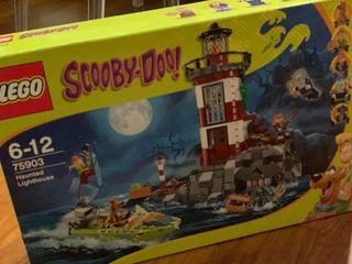 Lego Scooby Doo Haunted Lighthouse 75903 Hobbies Toys Toys Games On Carousell The ride transports guests in a vehicle equipped with light guns that are used to shoot at various targets to collect points. lego scooby doo haunted lighthouse