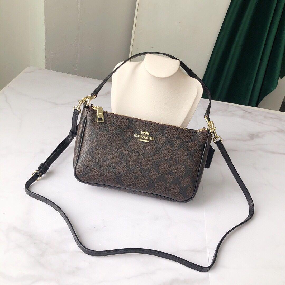 Coach top 2025 handle pouch