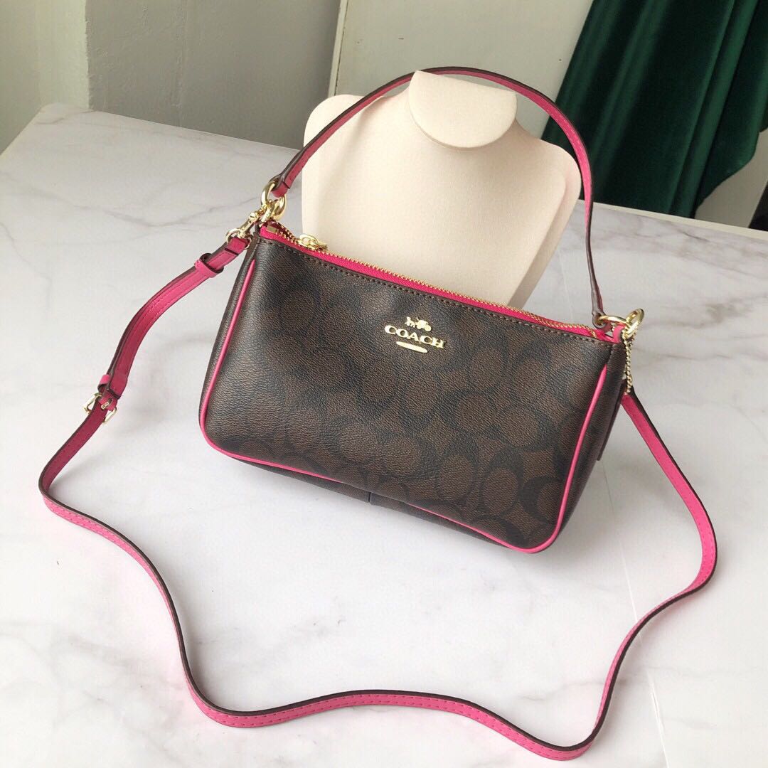 Coach top handle pouch store
