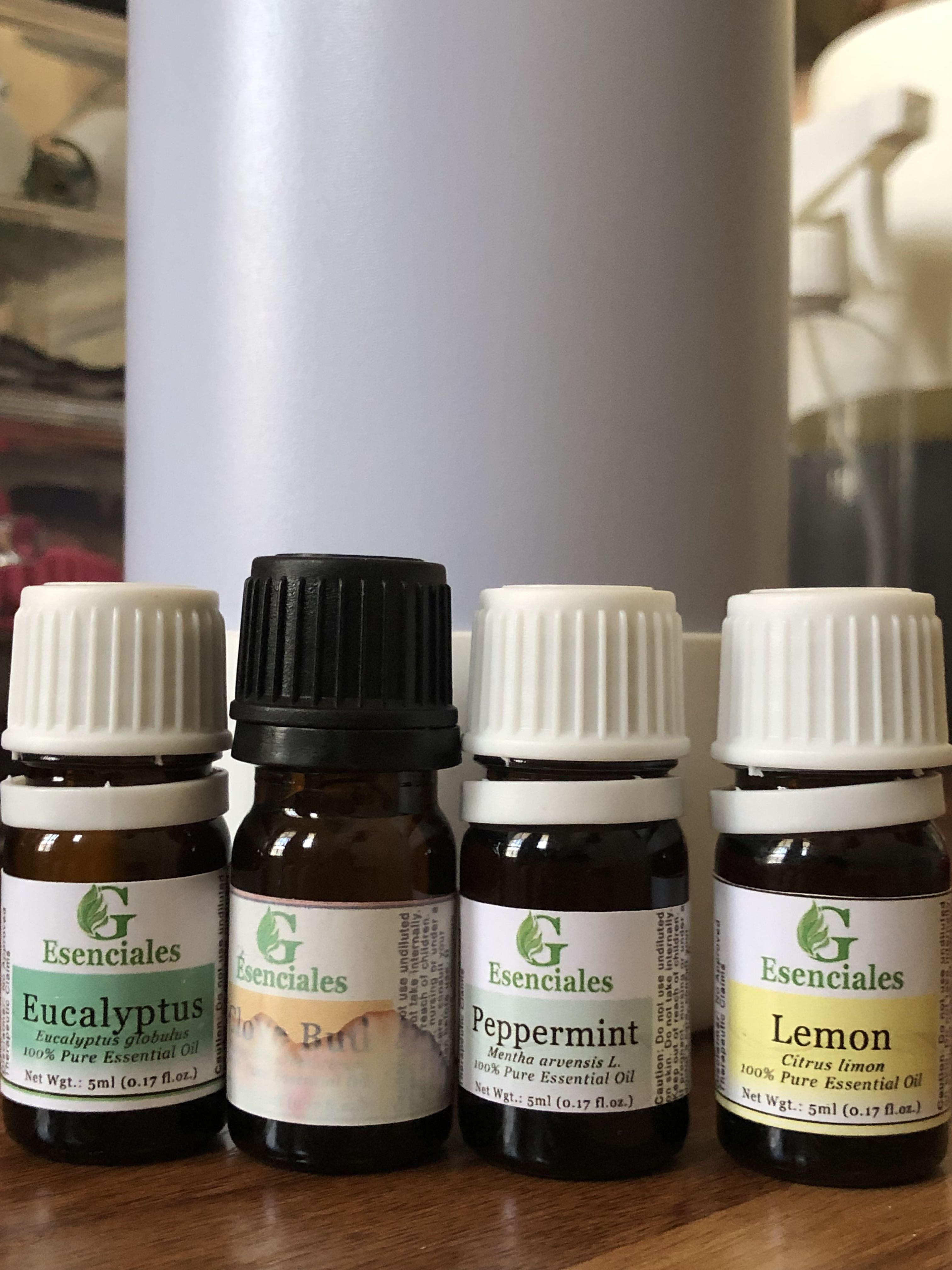 Esenciales 4 Essential Oils - Take all! (Category: Home Fragrance) located in Las Pinas. Submitted by portraitsoftracy (Listing ID 1099786911, Image 2). Description: - bought for 550 pesos - never used, only opened to smell it from the bottle - scents: lemon, peppermint, cloves, and eucalyptus - tags: Essential Oils, Lemon, Peppermint, Cloves, Eucalyptus - zoom in on the pics of the bottles to see that even a drop was never used .