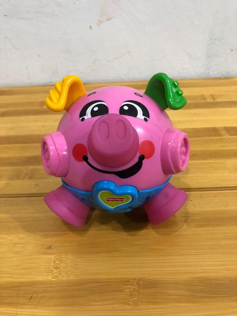 Fisher price bounce and giggle shop pig