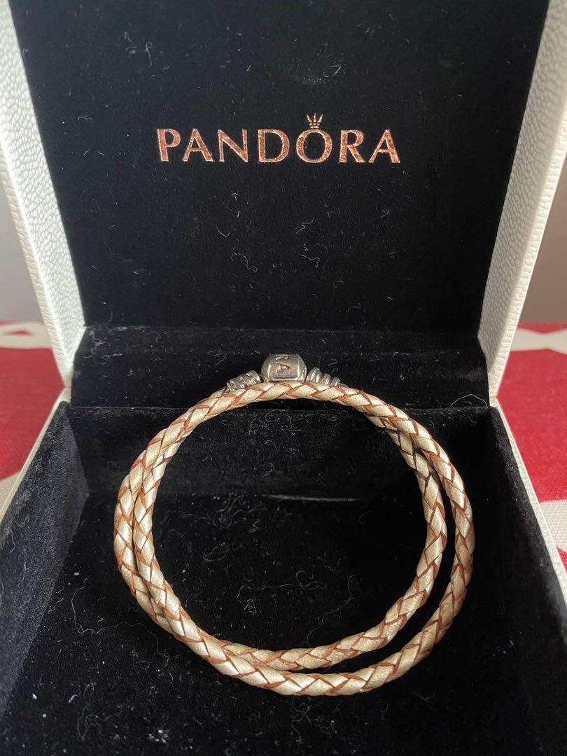 Pandora charm bracelet - double woven leather (Category: Bracelets) located in Quezon City. Submitted by danasb (Listing ID 1099143746, Image 1). Description: Authentic Pandora double woven leather bracelet in color pearl (beige), D1 size (fits small wrists up to 16cm) There is darkening on the leather of the pearl one from cleaning. RFS: downsizing closet, barely using them Please DM should you need more photos! Thanks!.