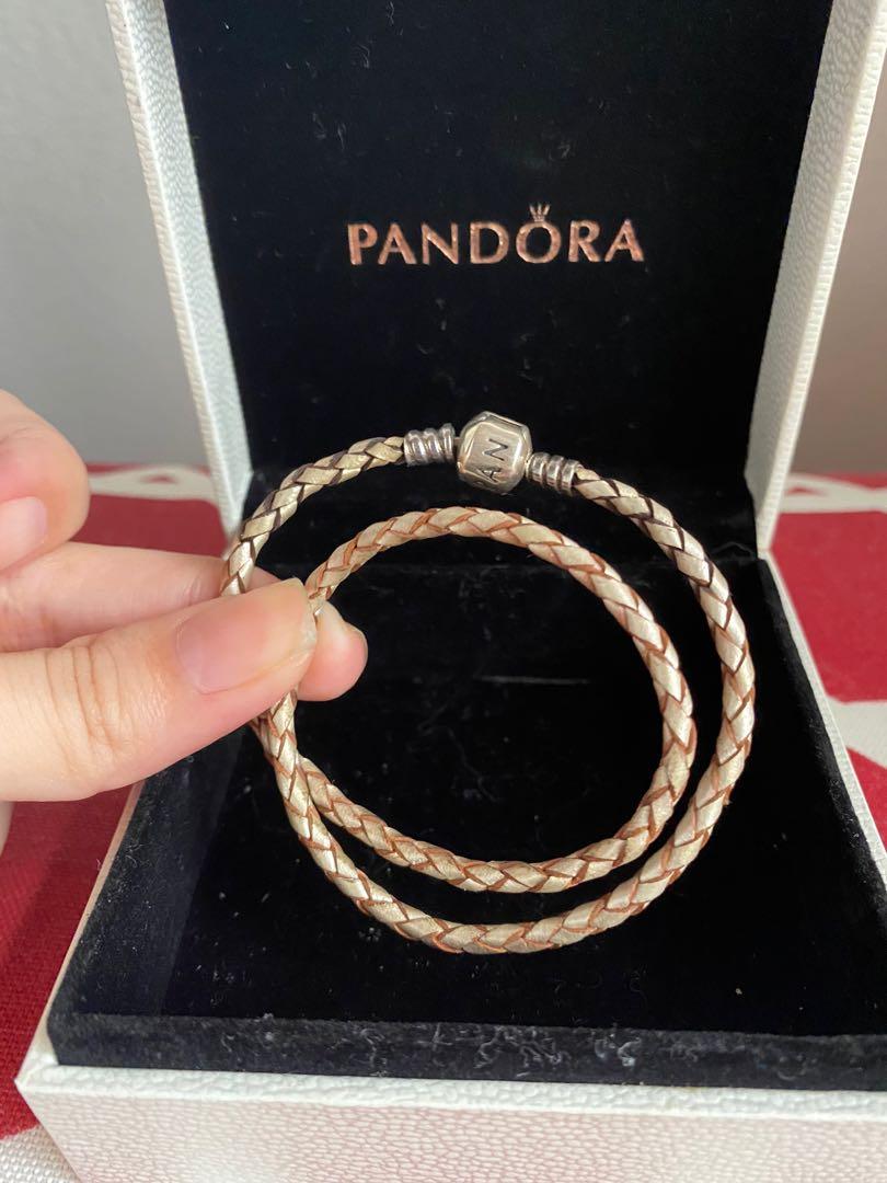 Pandora charm bracelet - double woven leather (Category: Bracelets) located in Quezon City. Submitted by danasb (Listing ID 1099143746, Image 2). Description: Authentic Pandora double woven leather bracelet in color pearl (beige), D1 size (fits small wrists up to 16cm) There is darkening on the leather of the pearl one from cleaning. RFS: downsizing closet, barely using them Please DM should you need more photos! Thanks!.