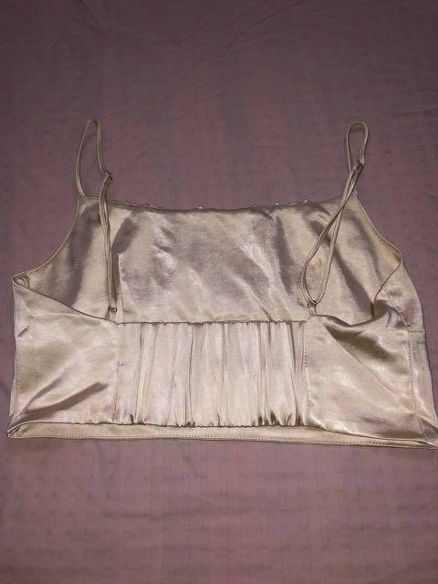 Zara Satin Ruched Crop Top (Category: Sleeveless) located in Quezon City. Submitted by as.declutters (Listing ID 1099819743, Image 3). Description: This is a Zara Sayin Ruched Crop Too Color: Light Beige ONLY USED TWICE. Fits size Small-Medium. 800 + shipping fee (can be arranged by buyer or through Zoom/DPX) PM me for inquiries/details. RFS: Decluttering.