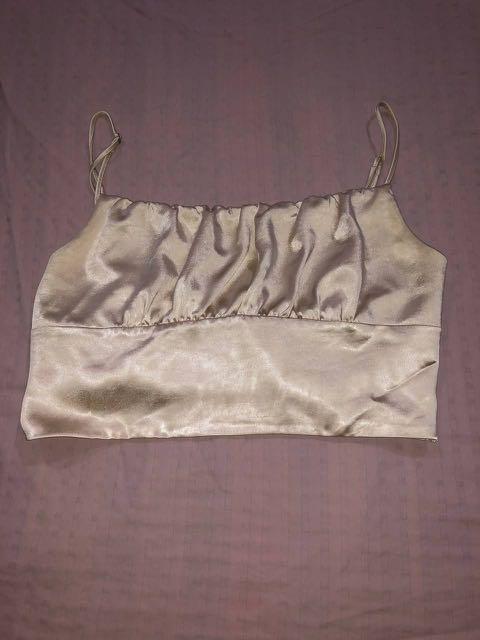 Zara Satin Ruched Crop Top (Category: Sleeveless) located in Quezon City. Submitted by as.declutters (Listing ID 1099819743, Image 2). Description: This is a Zara Sayin Ruched Crop Too Color: Light Beige ONLY USED TWICE. Fits size Small-Medium. 800 + shipping fee (can be arranged by buyer or through Zoom/DPX) PM me for inquiries/details. RFS: Decluttering.