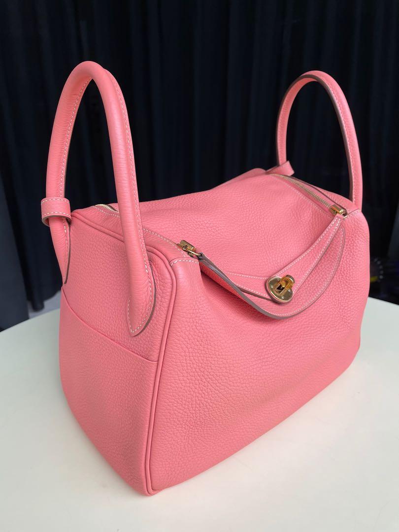 Hermes Lindy 30 Crevette GHW (Category: Bags & Wallets) located in Singapore. Submitted by melodyluxury (Listing ID 1100009498, Image 2). Description: Very good used condition Protective seals on hardware still intact Stamp Q Clemence Leather Very sweet colour n versatile with any clothings Ghw is beautiful and rare for Lindy Lindy size 30 is perfect for daily use Comes with box, dustbag, bababebi cert n complimentary pillow cushion to hold the b