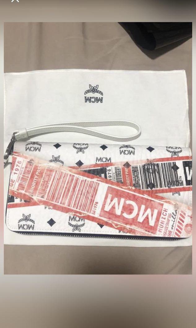 MCM flight print wallet Luxury Accessories on Carousell
