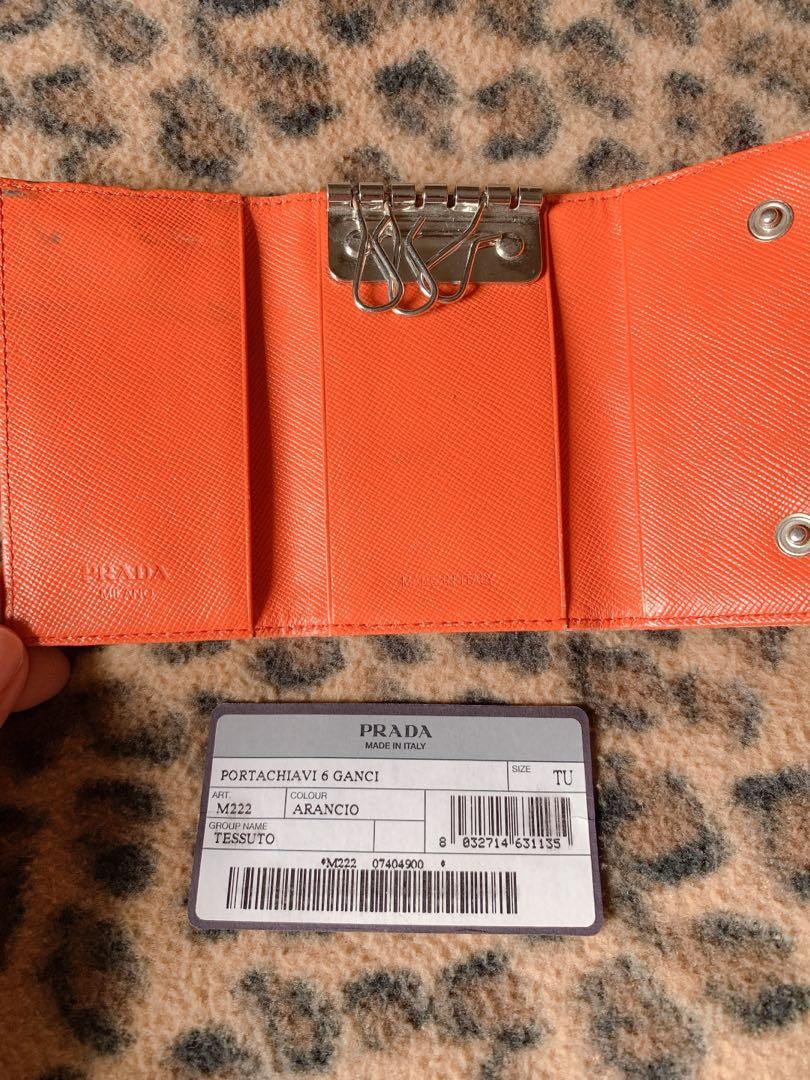 Prada key holder wallet (Category: Luxury Bags & Wallets) located in Malabon City. Submitted by akbeautique (Listing ID 1100008146, Image 2). Description: authentic Prada key holder with authenticity card. With normal signs of usage..